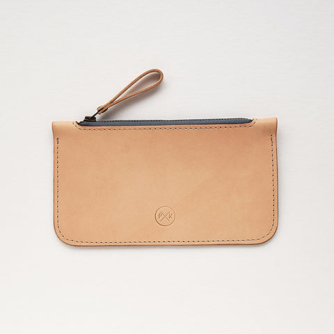 Beautifully handcrafted zip purse by Paula Kirkwood made from a luxurious, supple, Italian vegetable tanned leather. A leather that is full of character and will become even more desirable over time and wear. It is free of dyes and colours, and will darken with age, creating a beautiful organic patina.