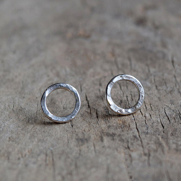 Handmade Sterling Silver stud earrings with a hammered surface inspired by textures found in the natural world.