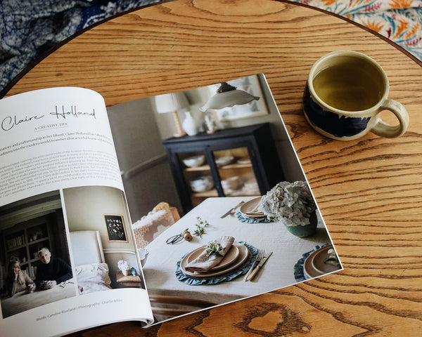 91 Magazine Issue 16 is an independent interiors and lifestyle magazine. Magazine on table with cup of herbal tea.