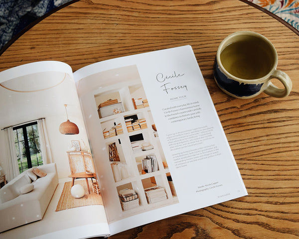 91 Magazine Issue 16 is an independent interiors and lifestyle magazine. Magazine on table with cup of herbal tea.