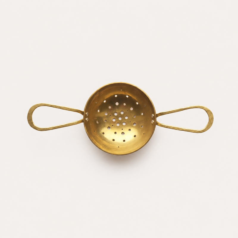 Handmade brass and silver tea strainer with loop handles by raz|maker, made in Cornwall