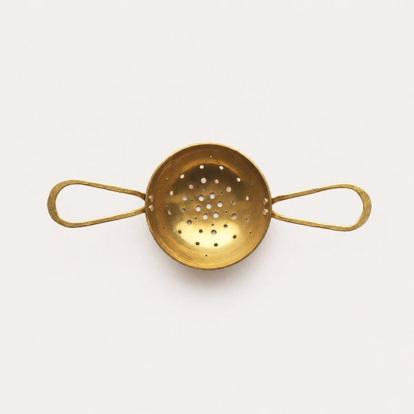 Handmade brass and silver tea strainer with loop handles by raz|maker, made in Cornwall