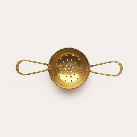 Handmade brass and silver tea strainer with loop handles by raz|maker, made in Cornwall