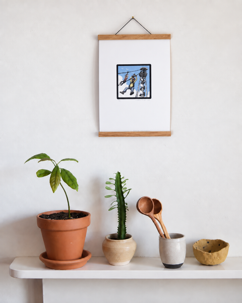 Brighton Zip fine art print displayed on a wall with plants and handmade homeware