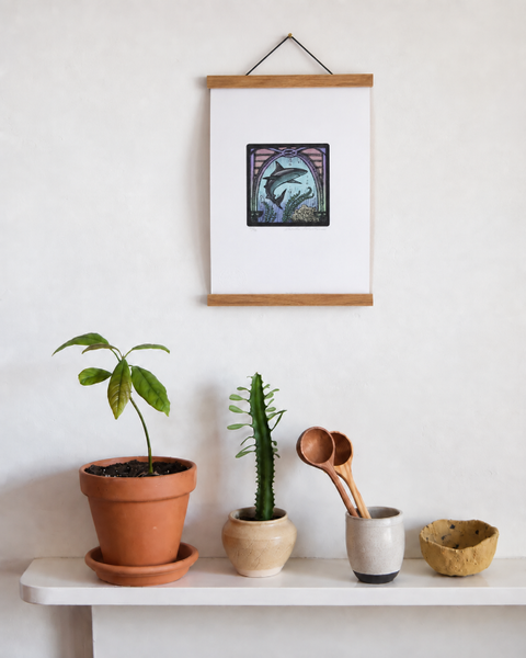 Sea Life Centre Brighton fine art print displayed on a wall with plants and handmade homeware