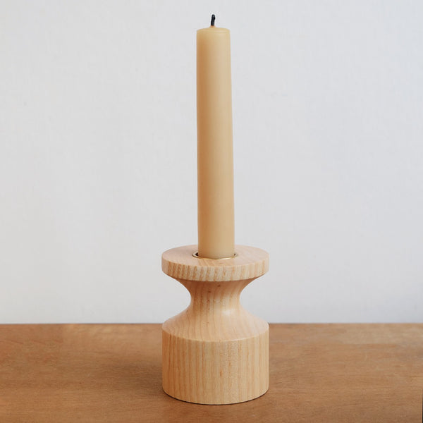 Handcrafted Wooden Candlestick by Selwyn House. Each candle holder is turned from a single piece of Ash. The weight of the wooden base means the candlestick is steady and sturdy. Free gift wrapping and shipped using eco-friendly packaging.