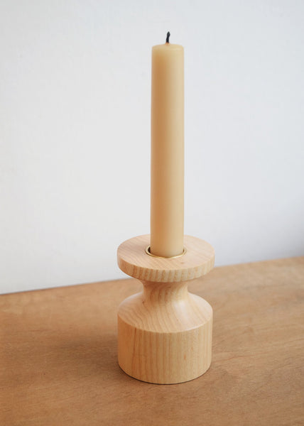 Handcrafted Wooden Candlestick by Selwyn House. Each candle holder is turned from a single piece of Ash. The weight of the wooden base means the candlestick is steady and sturdy. Free gift wrapping and shipped using eco-friendly packaging.