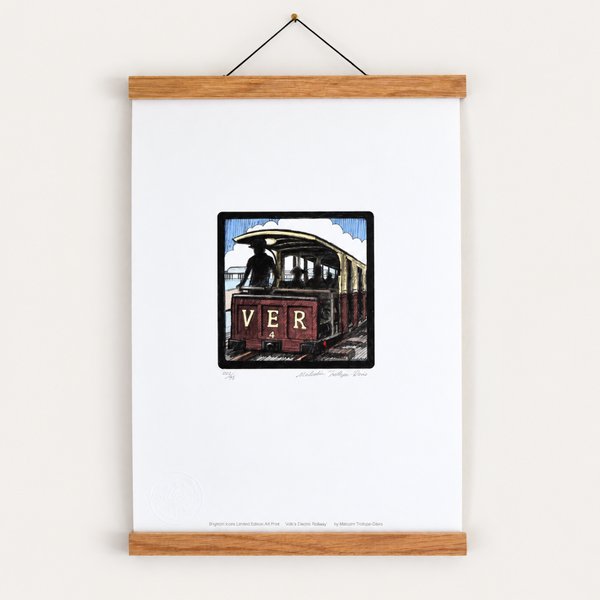 Volk's Electric Railway Brighton art print displayed in an oak poster hanger