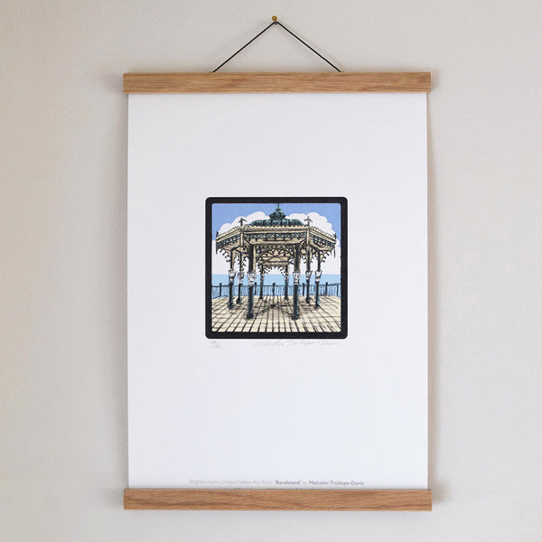 ‘Brighton Bandstand’ is part of the ‘Brighton Icons’ collection. A series of limited edition art prints numbered 1 to 75 signed by the artist Malcolm Trollope-Davis and produced as an A3 giclee print.