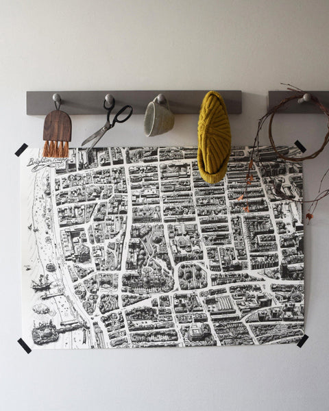A1 Brighton Map colouring poster displayed on a wall in a creative home setting