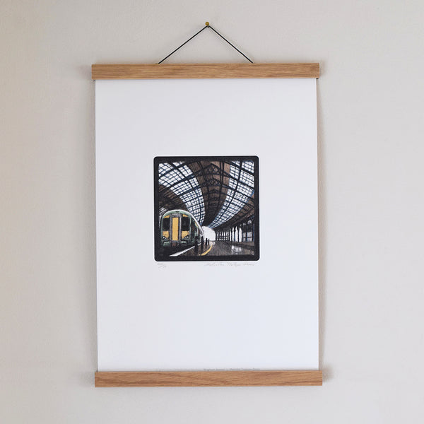 Brighton Station fine art print displayed in an oak poster hanger