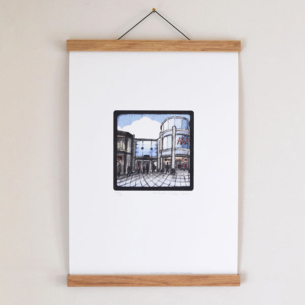 ‘Churchill Square’ is part of the ‘Brighton Icons’ collection. A series of limited edition art prints numbered 1 to 75 signed by the artist Malcolm Trollope-Davis and produced as an A3 giclee print.