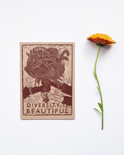 A beautiful set of postcards featuring mini prints hand carved from original linocut and woodcut prints by Rosanna Morris. The postcard designs include 'Diversity', 'Sunflower', 'The Revolution is Fertile' and 'Grow Food Grow Community'. 