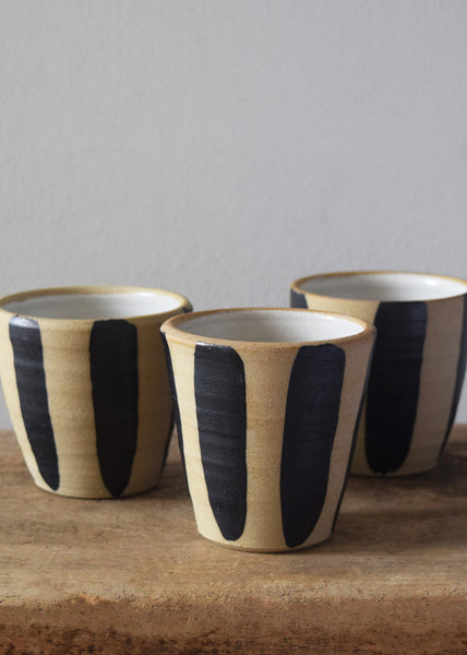 Hand-thrown indigo stripe stoneware beakers by Windmill Pottery
