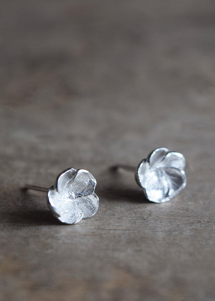 Beautiful handmade Hawthorn Blossom ear studs in Sterling Silver by Alice Stewart Jewellery. Consciously handcrafted from ethically sourced materials in solid Sterling Silver. Free gift wrapping and shipped using eco-friendly packaging.