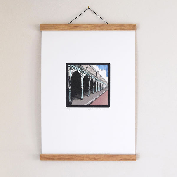‘Madeira Terrace’ is part of the ‘Brighton Icons’ collection. A series of limited edition art prints numbered 1 to 75 signed by the artist Malcolm Trollope-Davis and produced as an A3 giclee print. Madeira Terrace is a Grade 2 listed, 865-metre-long stretch of seafront arches and promenade on Madeira Drive in Brighton.