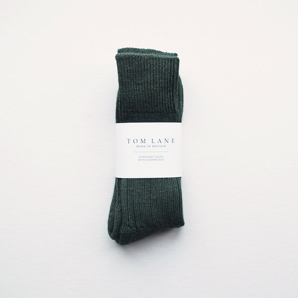 These soft and cosy Alpaca socks in moss are perfect for wearing inside your walking boots or wellies! They have a cushion sole for extra comfort and they are breathable to resist moisture. These socks have been made in Nottinghamshire by one of the oldest sock manufacturers in the UK using traditional techniques.