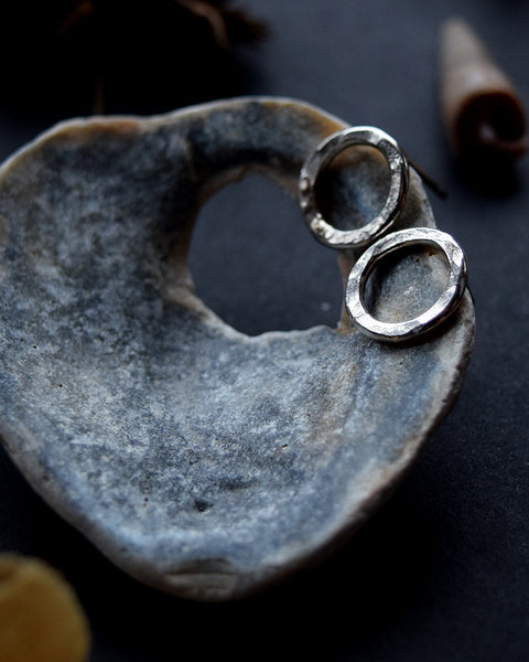 Handmade Sterling Silver stud earrings with a hammered surface inspired by textures found in the natural world.