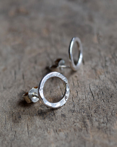 Handmade Sterling Silver stud earrings with a hammered surface inspired by textures found in the natural world.