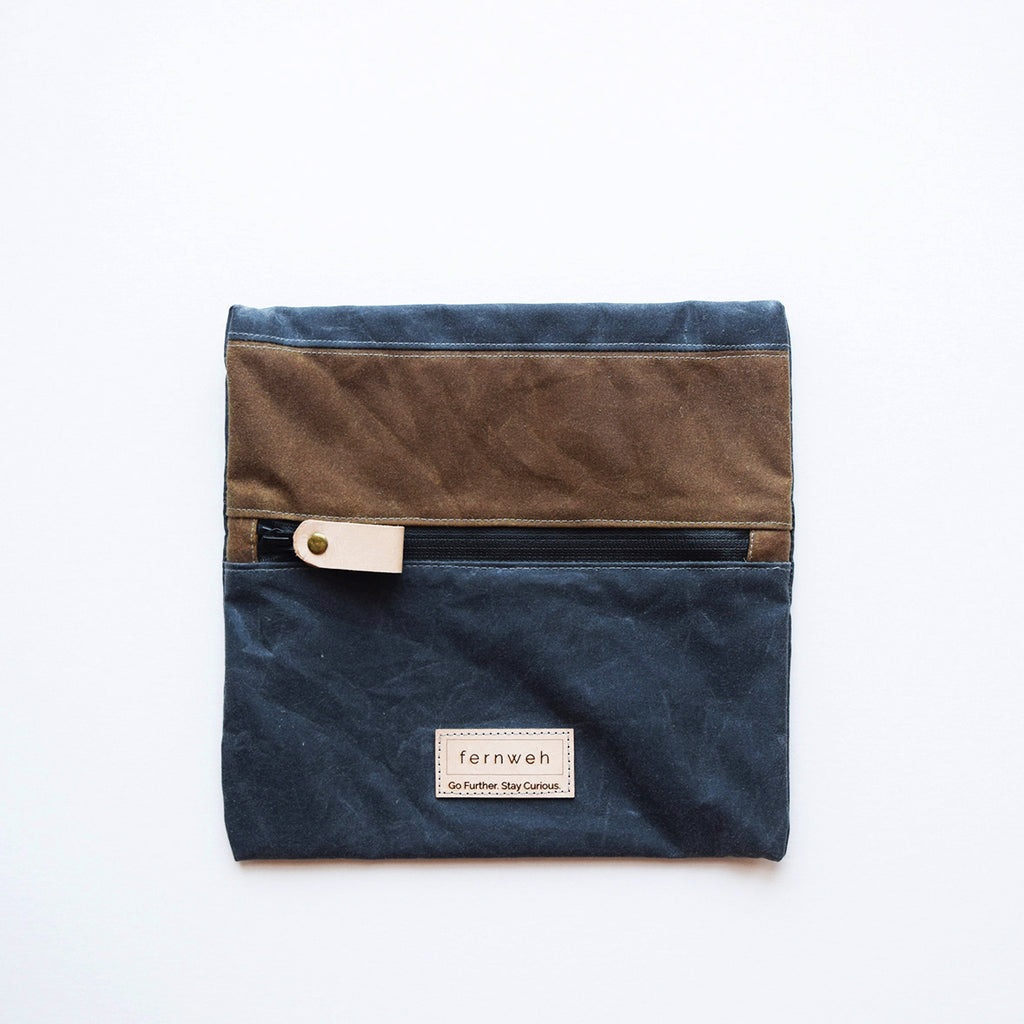 A beautiful and practical waxed cotton outdoor pouch, designed and handcrafted in a seaside studio in Aberdeen. This pouch is perfect for keeping your important items, like maps, travel documents, phone, or other essentials safe when out on your everyday adventures, travels and hiking trips.