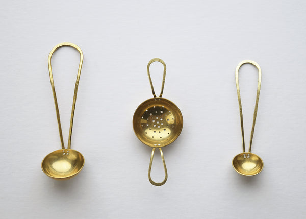 Beautiful hand-formed tableware by Raz Maker, made from brass and riveted with eco-silver. 