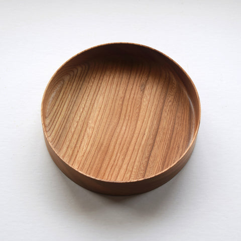 Handcrafted Wooden Tray by Selwyn House. Each of these Elm Trays has been hand-turned from a single piece of solid Elm, and finished in food-safe Danish Oil. Free gift wrapping and shipped using eco-friendly packaging.