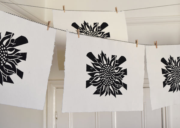 'Sunflower' Charity Art Print - A original linocut handcrafted and hand printed by artist Dorte Januszewski. All profits from each art print will be donated to the Disasters Emergency Committee, Ukraine Humanitarian Appeal.