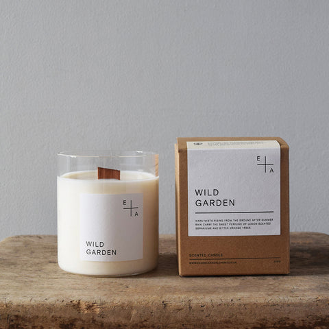 Wild Garden, a botanical aromatherapy candle by Essence and Alchemy, 100% natural, sustainable and eco-friendly. Candles are hand-poured in a British made re-usable mouth-blown glass beaker with a wooden wick. 
