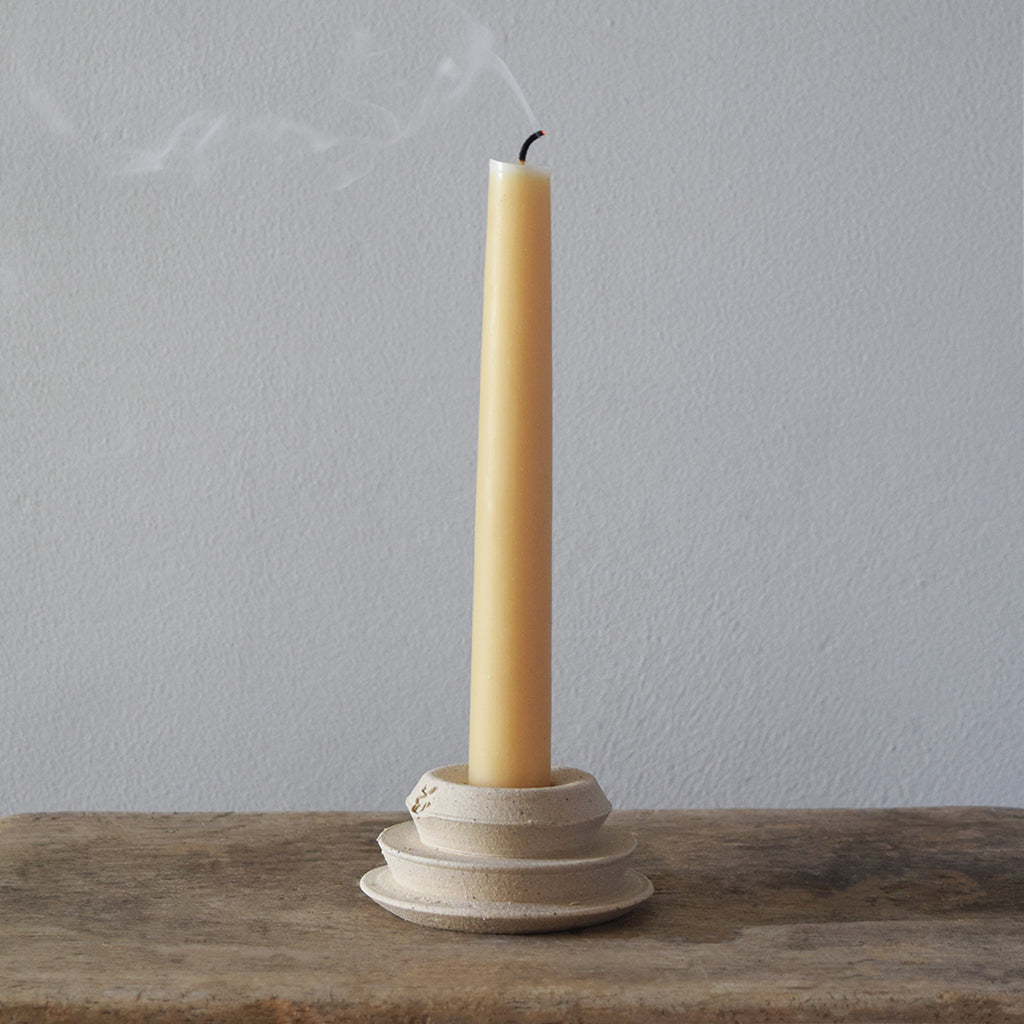 Handmade Windmill Pottery ceramic candle holder with a raw finish. This beautiful candle holder is perfect for everyday use. Made from stoneware clay in Sussex by ceramicist Anna Sandberg. 