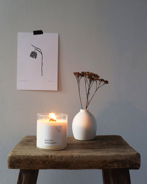 Winter Bergamot, a botanical aromatherapy candle by Essence and Alchemy, 100% natural, sustainable and eco-friendly. Candles are hand-poured in a British made re-usable mouth-blown glass beaker with a wooden wick. 