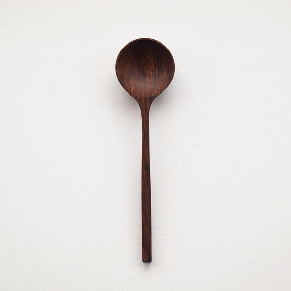 Handcrafted Wooden Spoon by Selwyn House. A classic utensil handcrafted from rich and beautiful Brown Oak. Each spoon is hand-carved and sits so comfortably in the hand. Comes wrapped in tissue paper and our drawstring cotton bag. Shipped using eco-friendly packaging.