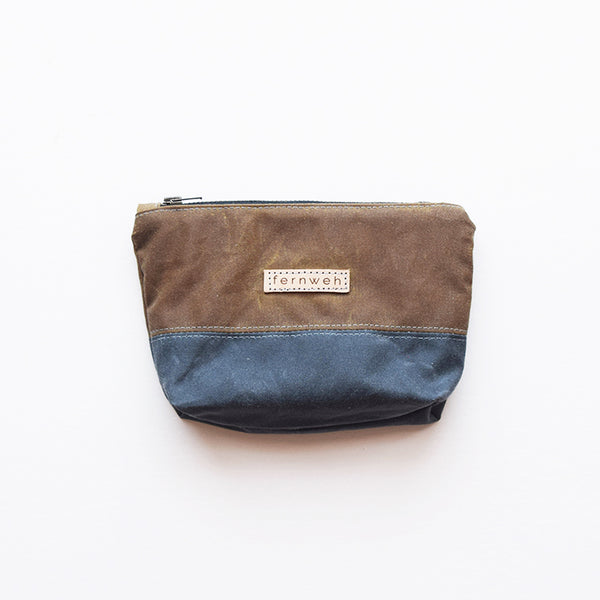 Designed and handcrafted in a seaside studio in Aberdeen, this beautiful and practical pouch is perfect for keeping all your essentials safe when out on your everyday adventures. It's made from waxed cotton canvas which is water resistant and durable.